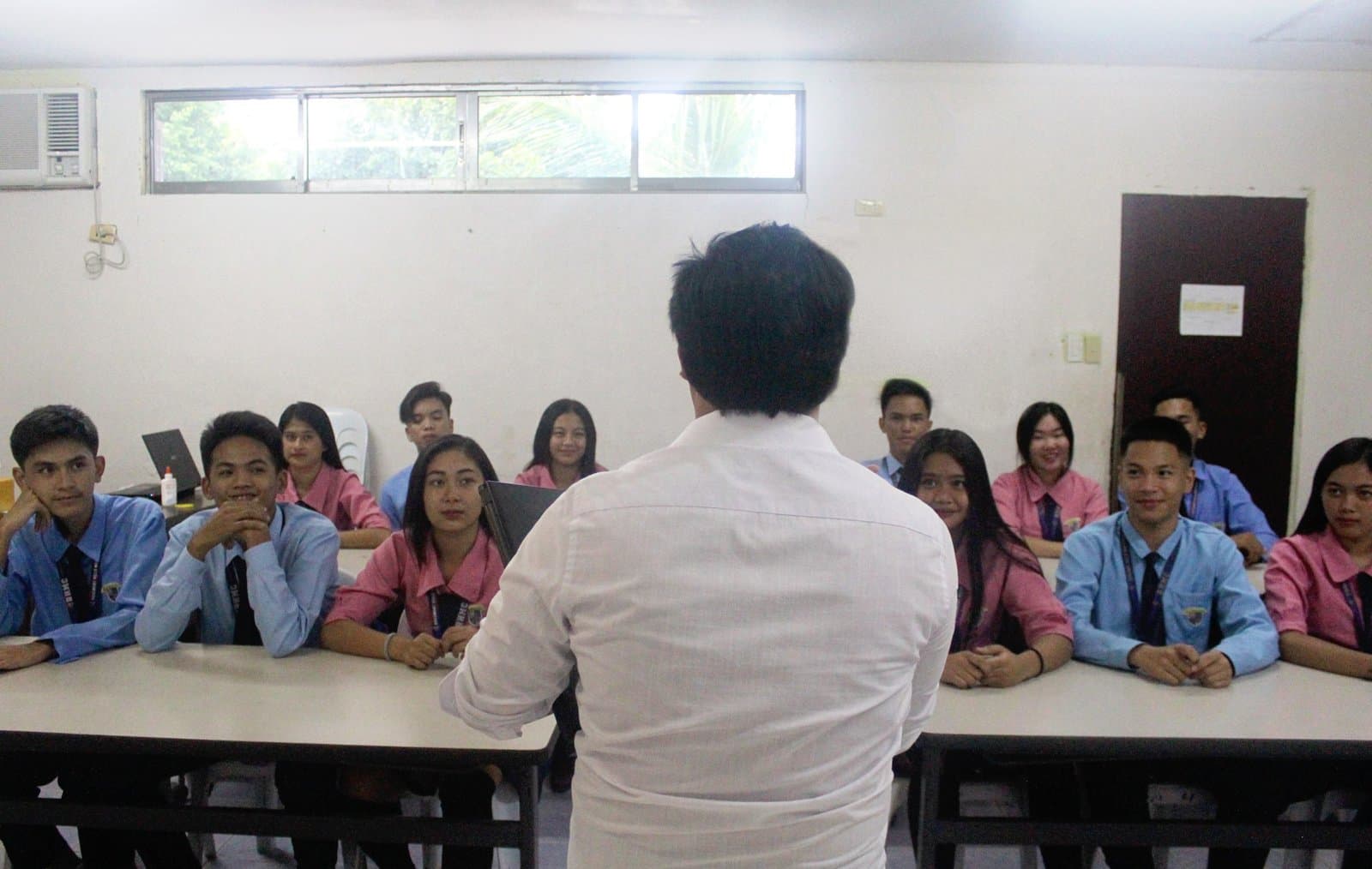 RHMC legacy photo: Classroom discussion with teacher and students